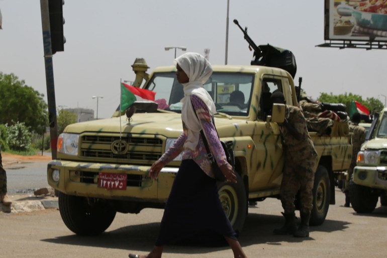 epa07622246 A general view shows Sudanese soldiers at one of the main roads leading to sit-in site outside the Sudanese army Headquarters, deserted safe for security forces after news of an early morning clearing from various media reports, in Khartoum, Sudan, 03 June 2019. according to media reports: 13 protesters were killed and several others injured on clashes between the Sudanese protester and Sudan military to break up a sit-in. in retaliation, after the opposition called for national civil disobedience to put pressure on the Transitional Military Council (TMC) to hand power over to a civilian administration. EPA-EFE/MARWAN ALI