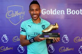 BURNLEY, ENGLAND - MAY 12: Pierre-Emerick Aubameyang of Arsenal poses with the golden boot trophy after the Premier League match between Burnley FC and Arsenal FC at Turf Moor on May 12, 2019 in Burnley, United Kingdom. (Photo by Alex Livesey/Getty Images)
