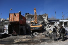 Israeli authorities demolish a building of Palestinians- - JERUSALEM - JANUARY 30: Israeli forces take security measures around the wreckage site after members of Israel’s Jerusalem Municipality demolished a building belonging to Palestinians, with the claim of the structure had been built “without authorization” at Wadi al-Joz neighborhood in Jerusalem on January 30, 2019.