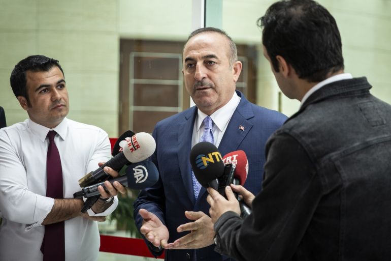 Minister of Foreign Affairs of Turkey, Mevlut Cavusoglu- - ANKARA, TURKEY - JULY 17: Minister of Foreign Affairs of Turkey, Mevlut Cavusoglu speaks to journalists at Esenboga International Airport in Ankara, Turkey on July 17, 2019.
