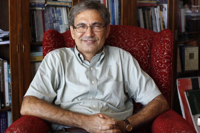 Nobel-winning Turkish author Orhan Pamuk poses at his house in Istanbul August 27, 2010. Pamuk, Turkey's most celebrated artist, has explored his country's struggle with tradition and modernity and its identity as a land that straddles East and West in novels infused with