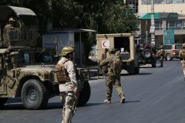 10 killed as huge explosion rocks Afghan capital - - KABUL, AFGHANISTAN - JULY 01: Afghan security officials secure the scene of a suicide bombing in Kabul, Afghanistan, July 01, 2019. At least 10 people were killed and 65 more injured in a suicide bombing, followed by gunfight at a Defense Ministry’s installation in the Afghan capital Kabul on Monday, officials and local media confirmed.