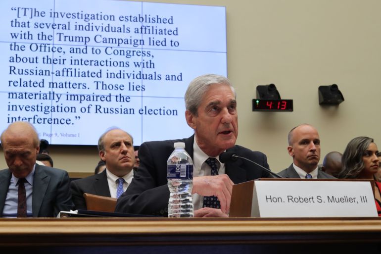 WASHINGTON, DC - JULY 24: A quote from The Mueller Report appears on a screen as former Special Counsel Robert Mueller testifies before the House Judiciary Committee about his report on Russian interference in the 2016 presidential election in the Rayburn House Office Building July 24, 2019 in Washington, DC. Mueller, along with former Deputy Special Counsel Aaron Zebley, will later testify before the House Intelligence Committee in back-to-back hearings on Capitol Hill. Chip Somodevilla/Getty Images/AFP== FOR NEWSPAPERS, INTERNET, TELCOS & TELEVISION USE ONLY ==