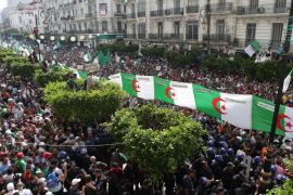 Protest against 'Bouteflika regime officials' in Algeria- - ALGIERS, ALGERIA - JULY 05 : Algerians stage a demonstration demanding regime officials -- who continue to work after former President Abdelaziz Bouteflika resigned -- to step down, in Algiers, Algeria on July 05, 2019. People demand on the demonstration, that coincides the same day with the 57th anniversary of the country’s independence in 1962, the resignation of officials who continue to work after former