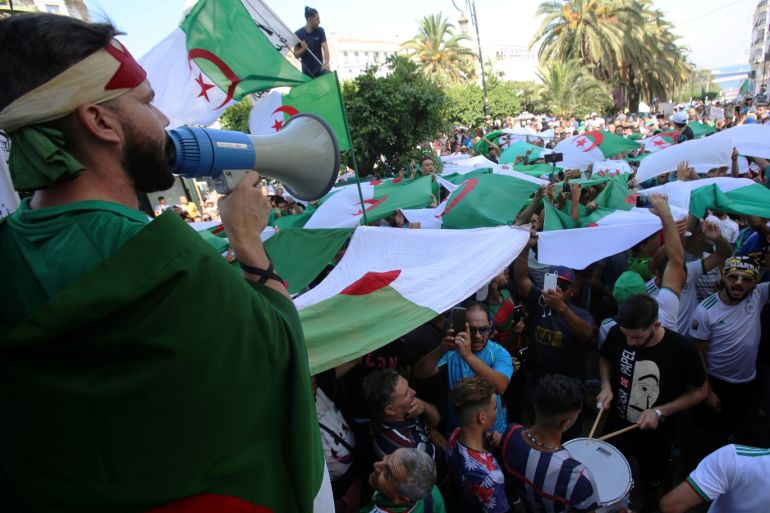 Demonstrators shout slogans during an anti-government protest in Algiers, Algeria July 26, 2019. REUTERS/Ramzi Boudina