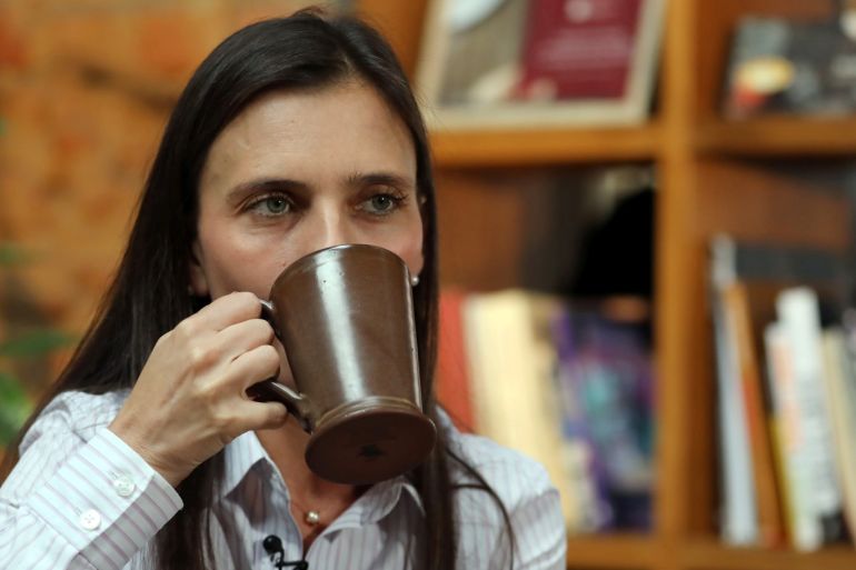 President of PROCAFECOL (Colombian coffee producer), Camila Escobar drinks coffee during an interview with Reuters in Bogota, Colombia June 5, 2019. Picture taken June 5, 2019. REUTERS/Luisa Gonzalez