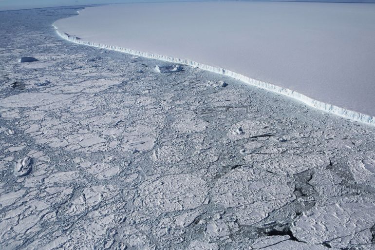 UNSPECIFIED, ANTARCTICA - OCTOBER 31: (One of a 115-image Best of Year 2017 set) The western edge of the famed iceberg A-68 (TOP R), calved from the Larsen C ice shelf, is seen from NASA's Operation IceBridge research aircraft, near the coast of the Antarctic Peninsula region, on October 31, 2017, above Antarctica. The massive iceberg was measured at approximately the size of Delaware when it first calved in July. NASA's Operation IceBridge has been studying how polar ice has evolved over the past nine years and is currently flying a set of nine-hour research flights over West Antarctica to monitor ice loss aboard a retrofitted 1966 Lockheed P-3 aircraft. According to NASA, the current mission targets 'sea ice in the Bellingshausen and Weddell seas and glaciers in the Antarctic Peninsula and along the English and Bryan Coasts.' Researchers have used the IceBridge data to observe that the West Antarctic Ice Sheet may be in a state of irreversible decline directly contributing to rising sea levels. The National Climate Assessment, a study produced every 4 years by scientists from 13 federal agencies of the U.S. government, released a stark report November 2 stating that global temperature rise over the past 115 years has been primarily caused by 'human activities, especially emissions of greenhouse gases'. Mario Tama/Getty Images/AFP== FOR NEWSPAPERS, INTERNET, TELCOS & TELEVISION USE ONLY ==