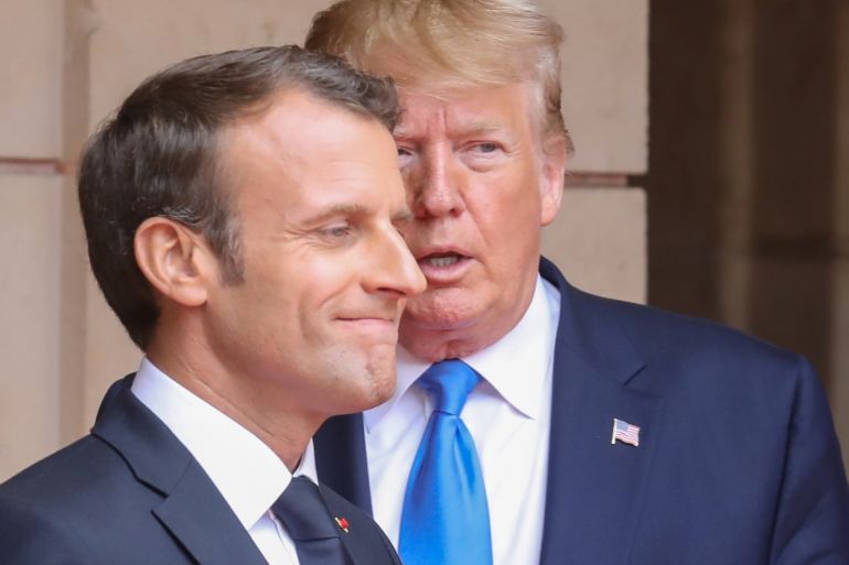 French President Emmanuel Macron speaks with U.S. President Donald Trump ahead of a meeting at the Prefecture of Caen on the sidelines of D-Day commemorations marking the 75th anniversary of the World War II Allied landings in Normandy France June 6 2019. Ludovic Marin/Pool via REUTERS