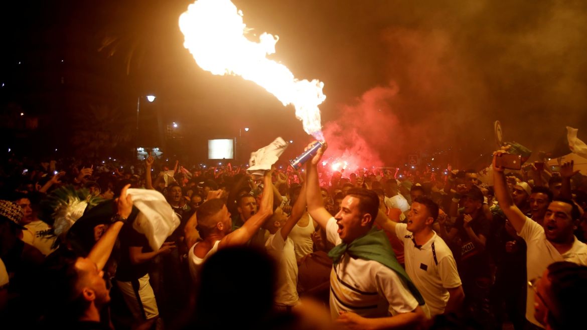 Soccer Football - Fans watch the Africa Cup of Nations 2019 - Final - Senegal v Algeria - Algiers, Algeria - July 19, 2019    Algeria fans celebrate after the match in Algiers  REUTERS/Ramzi Boudina