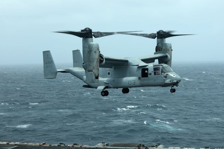 An MV-22 Osprey aircraft lands on the deck of USS Abraham Lincoln the Gulf of Oman near the Strait of Hormuz July 15, 2019. Picture taken July 15, 2019. REUTERS/Ahmed Jadallah