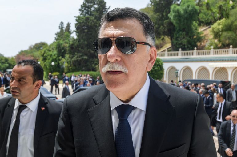 Libya's UN-recognised Prime Minister Fayez al-Sarraj attends the state funeral of late Tunisian president Beji Caid Essebsi at the presidential palace in the capital's eastern suburb of Carthage, Tunisia July 27, 2019. Fethi Belaid/Pool via REUTERS
