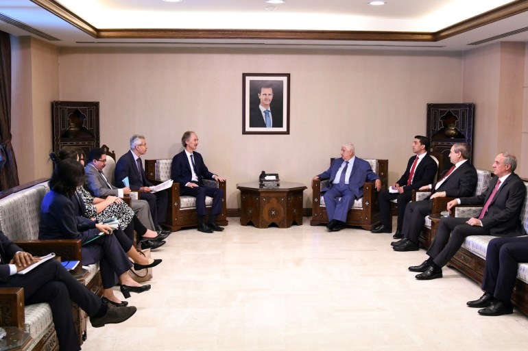 United Nations Special Envoy to Syria Geir Pedersen meets with Syria's Foreign Minister Walid Muallem in Damascus, Syria, in this handout released by SANA on July 10, 2019. SANA/Handout via REUTERS ATTENTION EDITORS - THIS IMAGE WAS PROVIDED BY A THIRD PARTY. REUTERS IS UNABLE TO INDEPENDENTLY VERIFY THIS IMAGE.