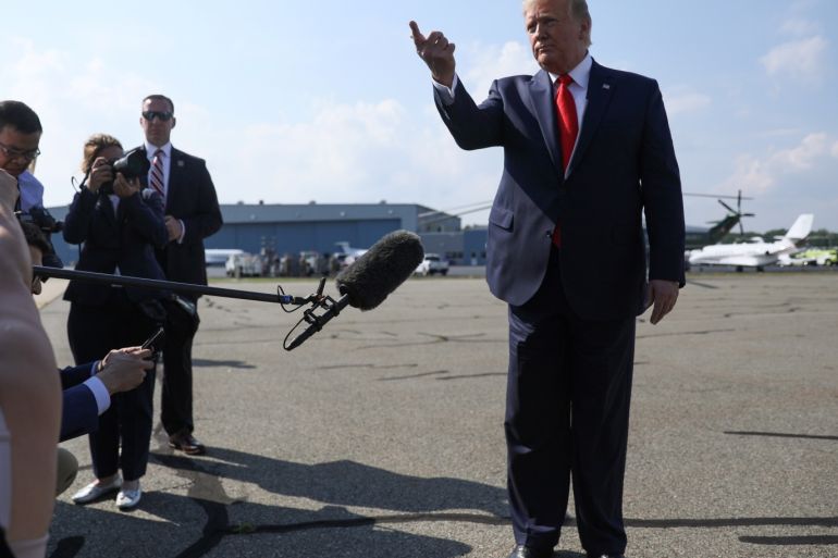 U.S. President Donald Trump talks to reporters before boarding Air Force One to return to Washington from Morristown Municipal Airport in Morristown, New Jersey, U.S. July 7, 2019. REUTERS/Jonathan Ernst
