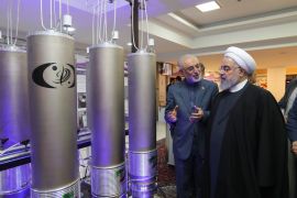 epa07687229 (FILE) - A handout file picture made available by the presidential office shows Iranian President Hassan Rouhani (R) and the head of Iran nuclear technology organization Ali Akbar Salehi inspecting nuclear technology on the occasion of Iran National Nuclear Technology Day in Tehran, Iran, 09 April 2019 (reissued 01 July 2019). According to Iranian media on 01 July 2019, Iran has passed the limit on its stockpile of low-enriched uranium by exceeding of 300kg set in a landmark 2015 nuclear deal made with world powers. The International Atomic Energy Agency (IAEA) said it will file a report. EPA-EFE/IRANIAN PRESIDENCY OFFICE HANDOU HANDOUT EDITORIAL USE ONLY/NO SALES
