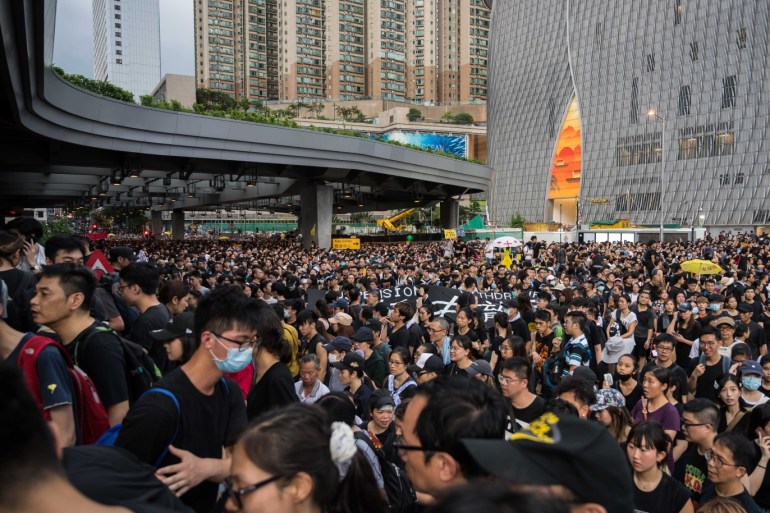 HONG KONG, CHINA - JULY 7: Protesters march towards the West Kowloon railway station during a protest against the proposed extradition bill on July 7, 2019. in Hong Kong, China. Over 230,000 people rallied at Kowloon on Sunday as pro-democracy demonstrators have continued on the streets of Hong Kong for the past month, calling for the complete withdrawal of a controversial extradition bill. Hong Kong's Chief Executive Carrie Lam has suspended the bill indefinitely, however protests have continued with demonstrators still calling for her resignation. (Photo by Billy H.C. Kwok/Getty Images)