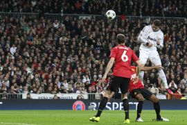 Football - Real Madrid v Manchester United - UEFA Champions League Second Round First Leg - Estadio Santiago Bernabeu, Madrid, Spain - 13/2/13 Cristiano Ronaldo (R) scores Real Madrid's first goal Mandatory Credit: Action Images / Carl Recine Livepic