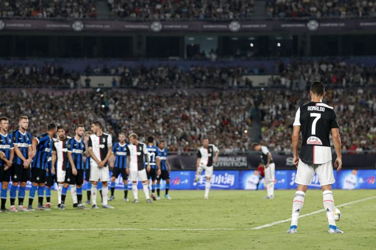 NANJING, CHINA - JULY 24: Cristiano Ronaldo of Juventus takes on a free kick his side's first goal during the International Champions Cup match between Juventus and FC Internazionale at the Nanjing Olympic Center Stadium on July 24, 2019 in Nanjing, China. (Photo by Fred Lee/Getty Images)
