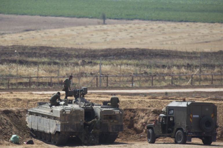 KFAR AZA, ISRAEL - MAY 15: (ISRAEL OUT) Israeli army forces are seen on the Israeli Gaza border near the Gaza Neighborhood of Shajaiya, on May 15, 2018 in Kfar Aza, Israel. Palestinians marked the Nakba, or 'catastrophe', commemorating the more than 700,000 Palestinians who fled or were expelled in the 1948 war surrounding Israel's creation. (Photo by Lior Mizrahi/Getty Images)