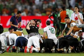 Soccer Football - Africa Cup of Nations 2019 - Semi Final - Algeria v Nigeria - Cairo International Stadium, Cairo, Egypt - July 14, 2019 Algeria players celebrate after the match REUTERS/Amr Abdallah Dalsh