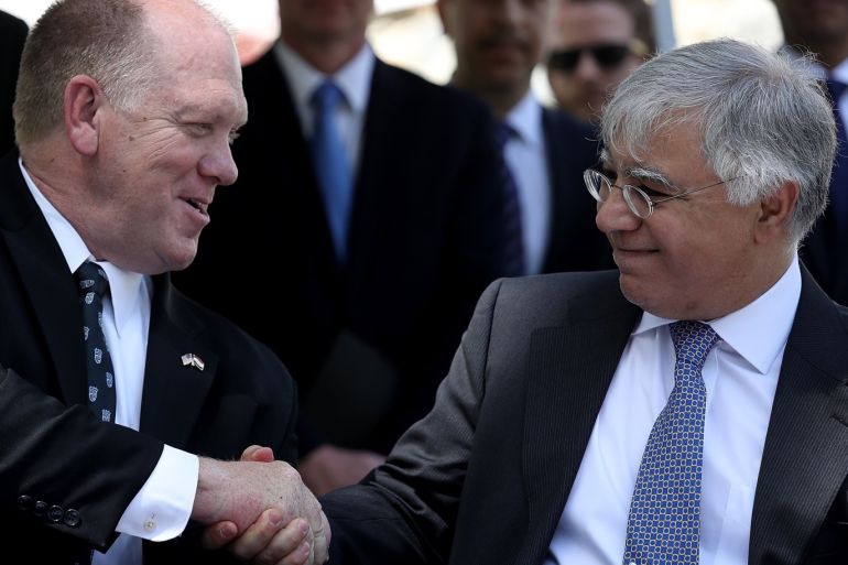 WASHINGTON, DC - MAY 02: U.S. Immigration and Customs Enforcement Deputy Director Thomas Homan shakes hands with Iraqi Ambassador to the United States Fareed Yasseen after signing an agreement returning ancient artifacts to Iraq that were seized from Hobby Lobby May 2, 2018 in Washington, DC. The artifacts, smuggled into the U.S. in violation of federal law and shipped to Hobby Lobby stores, include many tablets from the ancient city of Irisagrig, primarily from the Ur III and Old Babylonian period, are mostly legal and administrative documents, but also include a collection of Early Dynastic incantations and a bilingual religious text from the Neo-Babylonian period. Win McNamee/Getty Images/AFP== FOR NEWSPAPERS, INTERNET, TELCOS & TELEVISION USE ONLY ==