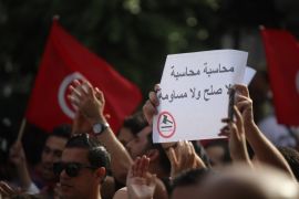 Anti-government protest in Tunisia- - TUNIS, TUNISIA - SEPTEMBER 16: Tunisian anti-government demonstrators rally against controversial law exempting officials accused of corruption, on Avenue Habib Bourguiba in Tunis, Tunisa, September 16, 2017.
