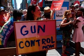 Protest in New York- - NEW YORK, USA - AUGUST 04 : A group of people take part in a rally to give a reaction against gun violence after the mass shooting in El Paso and Dayton cities at Times Square in New York, United States on August 04, 2019. Protesters demand gun control in the country.