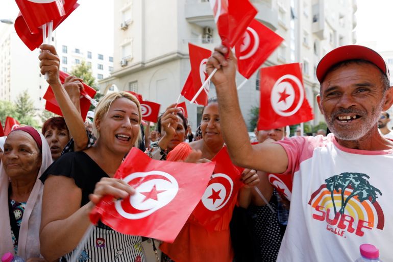 Supporters react after Tunisian Prime Minister Youssef Chahed submitted his candidacy for the presidential elections, in Tunis, Tunisia August 9, 2019. REUTERS/Zoubeir Souissi