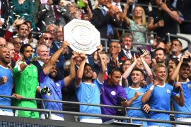 LONDON, ENGLAND - AUGUST 04: David Silva and Sergio Aguero of Manchester City lift the FA Community Shield following their team's victory in the FA Community Shield match between Liverpool and Manchester City at Wembley Stadium on August 04, 2019 in London, England. (Photo by Clive Mason/Getty Images)