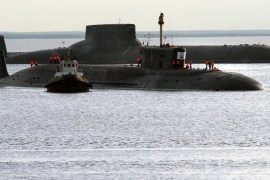 epa01791127 A photograph amde available on11July 2009, shows Russian submarine Yuri Dolgoruky (C) returning to the port of the Sevmash plant after the test trip, Severodvinsk, Russia, 10 July 2009. Yury Dolgoruky is the fourth generation submarine, first of the Borei class. On 13 February 2008 Yuriy Dolgorukiy was launched from its floating dock, the submarine's reactor was first activated on 21 November 2008, and submarine began its sea trials on 19 June 2009. EPA/PAVEL KONONOV EDITORIAL USE ONLY