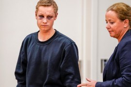 Philip Manshaus, who is suspected of an armed attack at Al-Noor Islamic Centre Mosque and killing his stepsister, appears at a court hearing with his lawyer Unni Fries in Oslo, Norway, August 12, 2019. NTB Scanpix/Cornelius Poppe via REUTERS ATTENTION EDITORS - THIS IMAGE WAS PROVIDED BY A THIRD PARTY. NORWAY OUT. NO COMMERCIAL OR EDITORIAL SALES IN NORWAY.