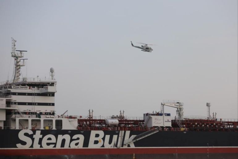A helicopter of Iranian Revolutionary Guard flies over Stena Impero, a British-flagged vessel owned by Stena Bulk, at Bandar Abbas port, in this undated handout photo. Iran, ISNA/WANA Handout via REUTERS ATTENTION EDITORS - THIS IMAGE WAS PROVIDED BY A THIRD PARTY.