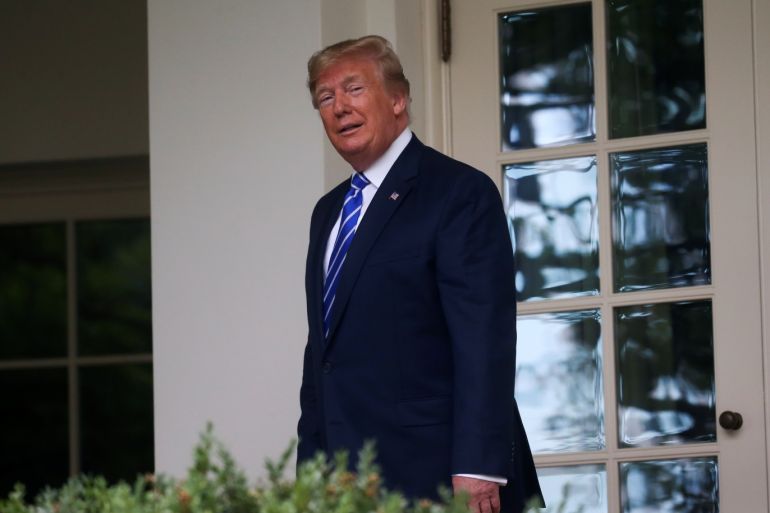 U.S. President Donald Trump stands outside the Oval Office after welcoming Mongolia’s President Khaltmaagiin Battulga at the White House in Washington, U.S., July 31, 2019. REUTERS/Leah Millis