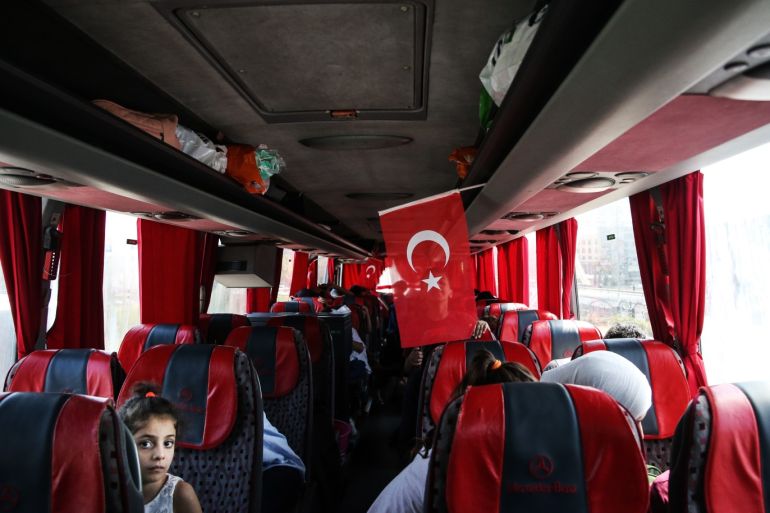 Syrian refugees in Turkey get back their country- - ISTANBUL, TURKEY - AUGUST 06: Syrians get on a bus to get back their country with the organisation of Esenyurt district governorship, Esenyurt Municipality and Provincial Directorates Of Migration Management in Istanbul, Turkey on August 06, 2019.
