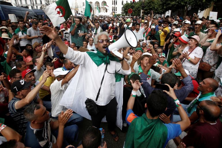 Demonstrators gesture and chant slogans during a protest demanding the removal of the ruling elite in Algiers, Algeria August 2, 2019. REUTERS/Ramzi Boudina