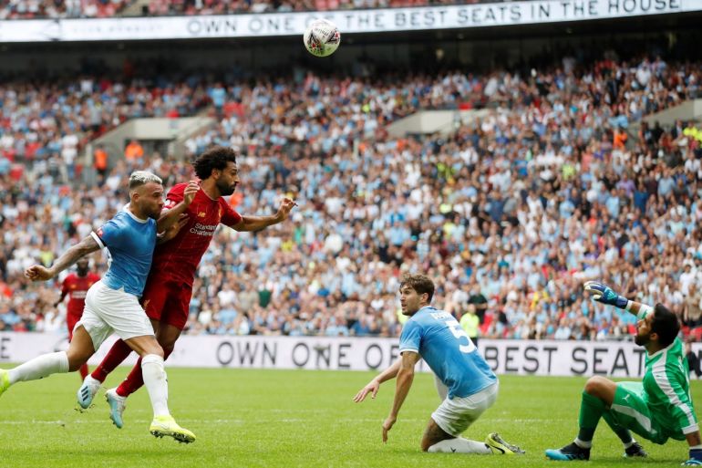 Soccer Football - FA Community Shield - Manchester City v Liverpool - Wembley Stadium, London, Britain - August 4, 2019 Liverpool's Mohamed Salah heads at goal Action Images via Reuters/Matthew Childs