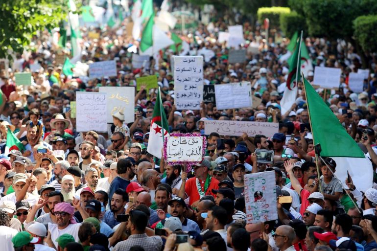 Demonstrators march as they shout slogans during an anti-government protest in Algiers, Algeria August 23, 2019. REUTERS/Ramzi Boudina