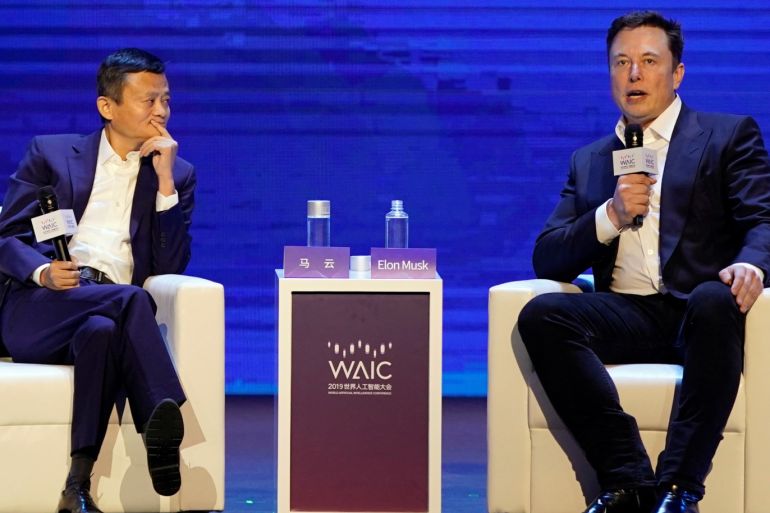 Tesla Inc CEO Elon Musk and Alibaba Group Holding Ltd Executive Chairman Jack Ma attend the World Artificial Intelligence Conference (WAIC) in Shanghai, China, August 29, 2019. REUTERS/Aly Song