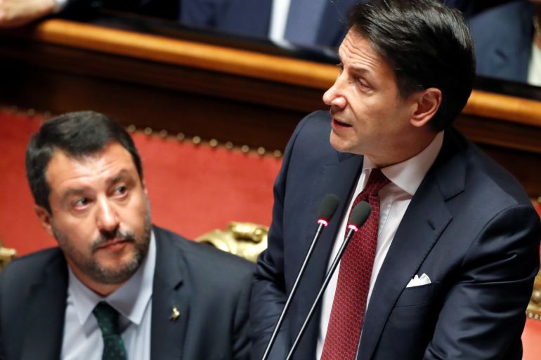 Italian Prime Minister Giuseppe Conte, next to Italian Deputy PM Matteo Salvini, addresses the upper house of parliament over the ongoing government crisis, in Rome, Italy August 20, 2019. REUTERS/Yara Nardi