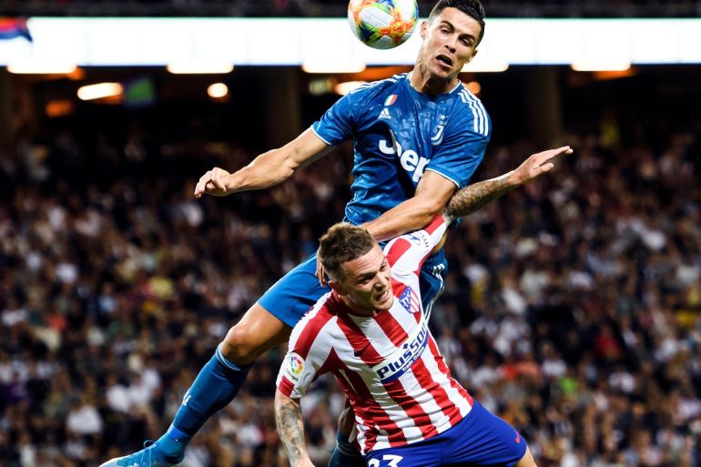 Soccer Football - International Champions Cup - Atletico Madrid v Juventus - Friends Arena - Stockholm, Sweden - August 10, 2019. Juventus' Cristiano Ronaldo in action with Atletico Madrid's Kieran Trippier. TT News Agency/Erik Simander via REUTERS ATTENTION EDITORS - THIS IMAGE WAS PROVIDED BY A THIRD PARTY. SWEDEN OUT.