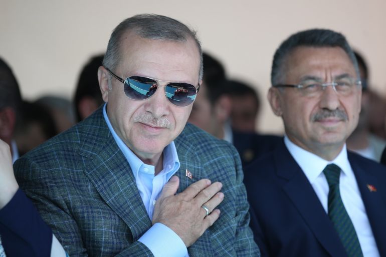 President of Turkey Recep Tayyip Erdogan- - BURSA, TURKEY - AUGUST 4: President of Turkey, Recep Tayyip Erdogan (L) attends a joint opening ceremony of Bursa City Hospital and Istanbul-Izmir highway in Bursa, Turkey on August 4, 2019. Turkey’s Vice President Fuat Oktay (R) also attended the opening ceremony.