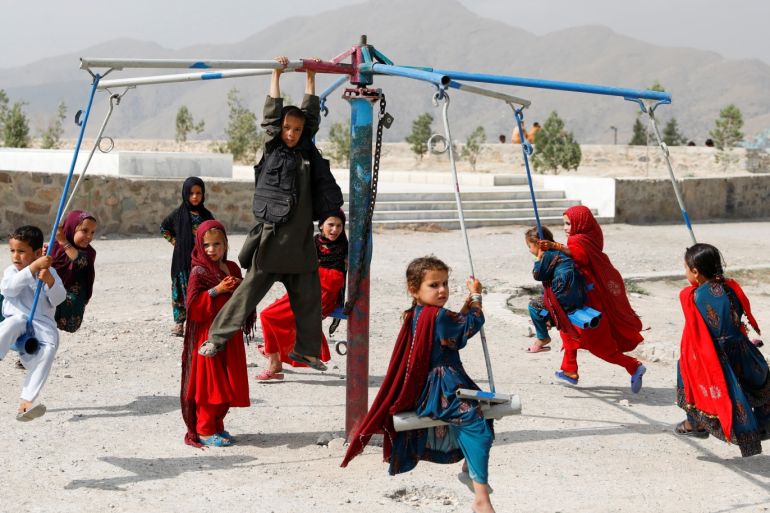 Afghan children ride on swings during the first day of the Muslim holiday of the Eid al-Adha, in Kabul, Afghanistan August 11, 2019.REUTERS/Mohammad Ismail