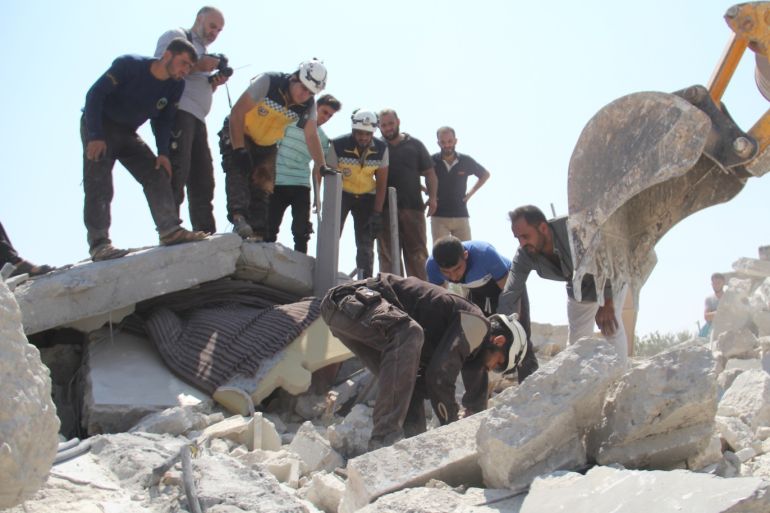 Airstrikes continue to hit Syria's Idlib : 6 dead- - IDLIB, SYRIA - AUGUST 17: Civil defence crews conduct search and rescue works after airstrikes of Assad Regime hit Deir Sharqi village in the de-escalation zone of Idlib, Syria on August 17, 2019. Six people were reported dead and three others injured.