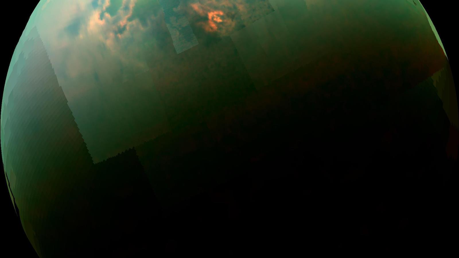 قمر تيتان يعد الجرم الوحيد في النظام الشمسي الذي يحتوي على سوائل دائمة على سطحه (الجزيرة)