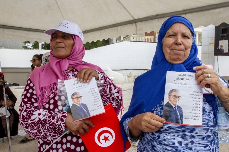 Presidential election in Tunisia- - JENDOUBA, TUNISIA - SEPTEMBER 04: Citizens hold photos of the Independent Candidate for the presidential election in Tunisia and former Defense Minister Abdelkarim Zbidi as he gathers with citizens during his visit in Jendouba region, as part of his election campaign ahead of the Presidential election in Tunisia, on September 04, 2019 in Jendouba, Tunisia.
