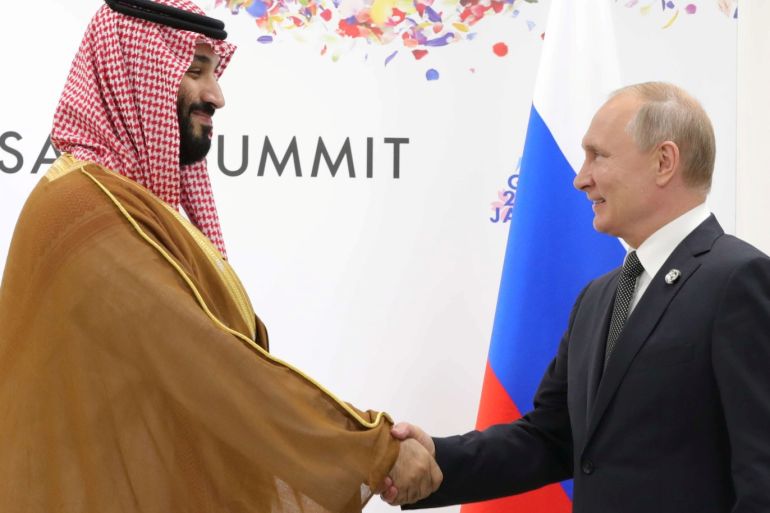 Russia's President Vladimir Putin shakes hands with Saudi Arabia's Crown Prince Mohammed Bin Salman during a meeting on the sidelines of the G20 summit in Osaka, Japan June 29, 2019. Sputnik/Mikhail Klimentyev/Kremlin via REUTERS ATTENTION EDITORS - THIS IMAGE WAS PROVIDED BY A THIRD PARTY.