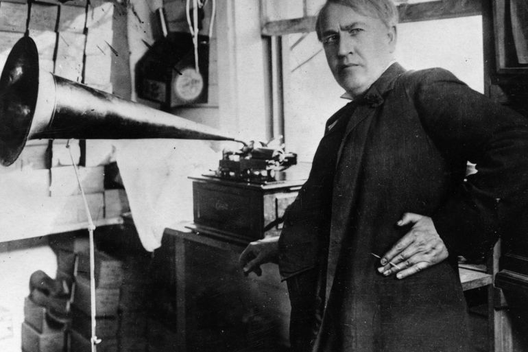Thomas Alva Edison (1847 - 1931) with the his invention, the phonograph. (Photo by Hulton Archive/Getty Images)