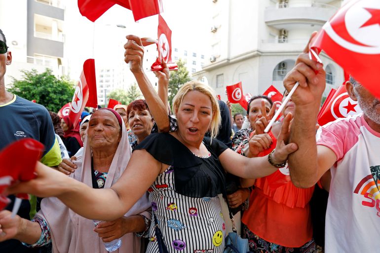 Supporters react after Tunisian Prime Minister Youssef Chahed submitted his candidacy for the presidential elections, in Tunis, Tunisia August 9, 2019. REUTERS/Zoubeir Souissi