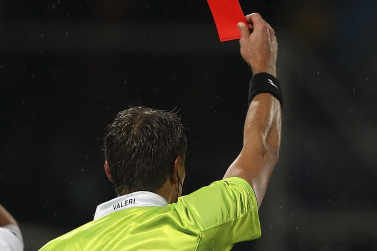 FLORENCE, ITALY - DECEMBER 02: Referee Paolo Valeri shows the red card to Shkodran Mustafi of UC Sampdoria during the Serie A match between ACF Fiorentina and UC Sampdoria at Stadio Artemio Franchi on December 2, 2012 in Florence, Italy. (Photo by Marco Luzzani/Getty Images)