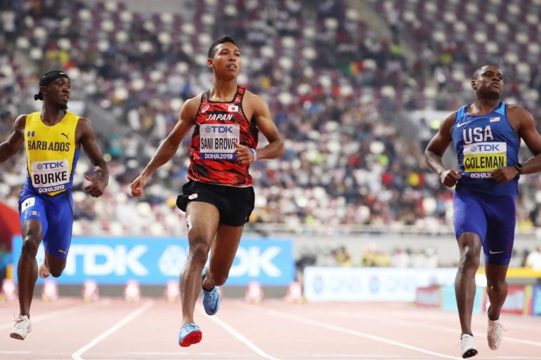 DOHA, QATAR - SEPTEMBER 27: (L-R) Mario Burke of Barbados, Abdul Hakim Sani Brown of Japan and Christian Coleman of the United States compete in the Men's 100 metres heats during day one of 17th IAAF World Athletics Championships Doha 2019 at Khalifa International Stadium on September 27, 2019 in Doha, Qatar. (Photo by Christian Petersen/Getty Images)