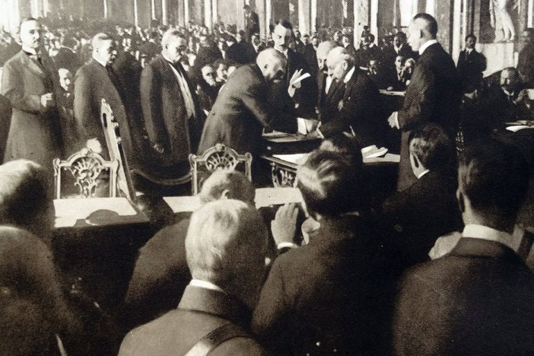 Treaty of Versailles is signed by Prime minister Clemenceau signs for France at the peace conference, June 1919. (Photo by: Universal History Archive/UIG via Getty images)